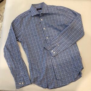 New men’s dress shirt stripped with blue, white and brown. Special rounded cuffs
